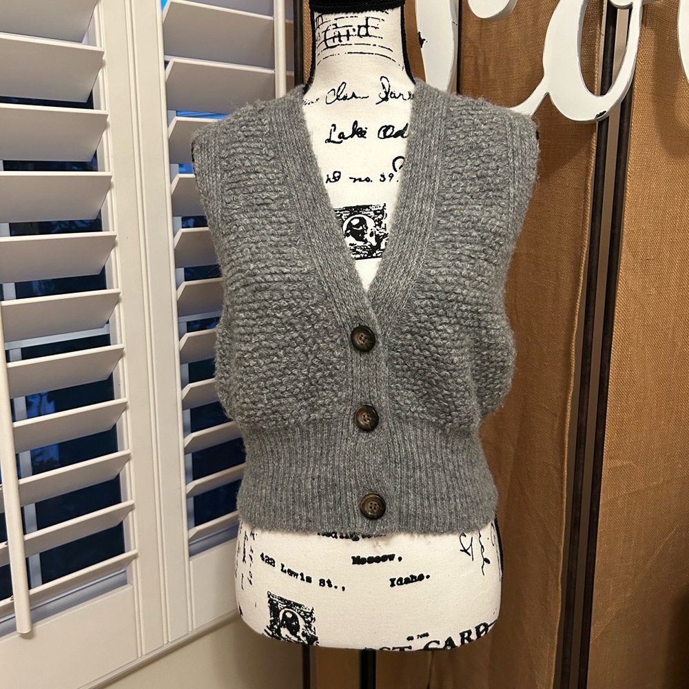 Grey sweater vest